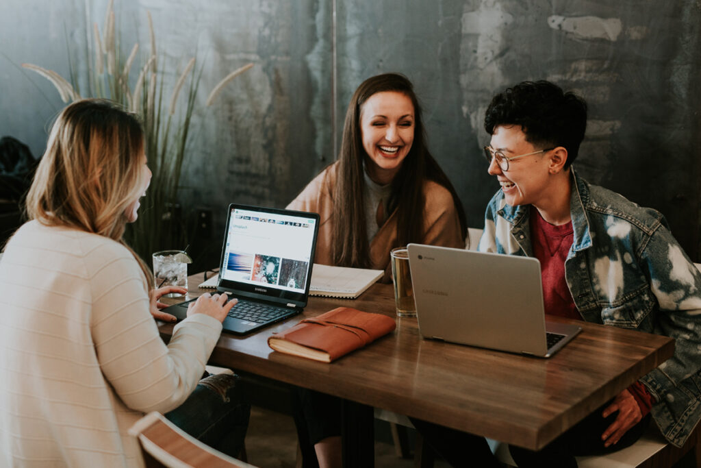 Three happy students. Photo: Brooke Cagle, from Unsplash.